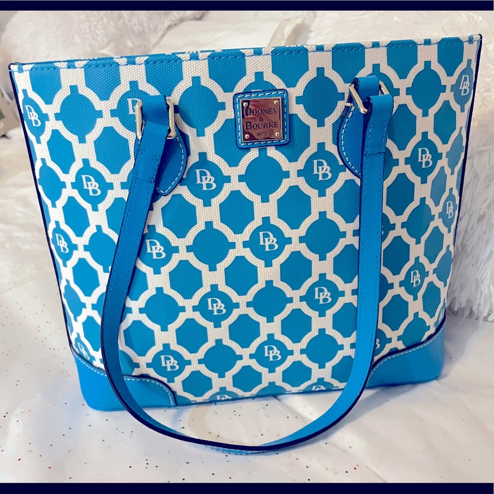 Dooney & Bourke Hand bag purse. Light blue/turquoise color